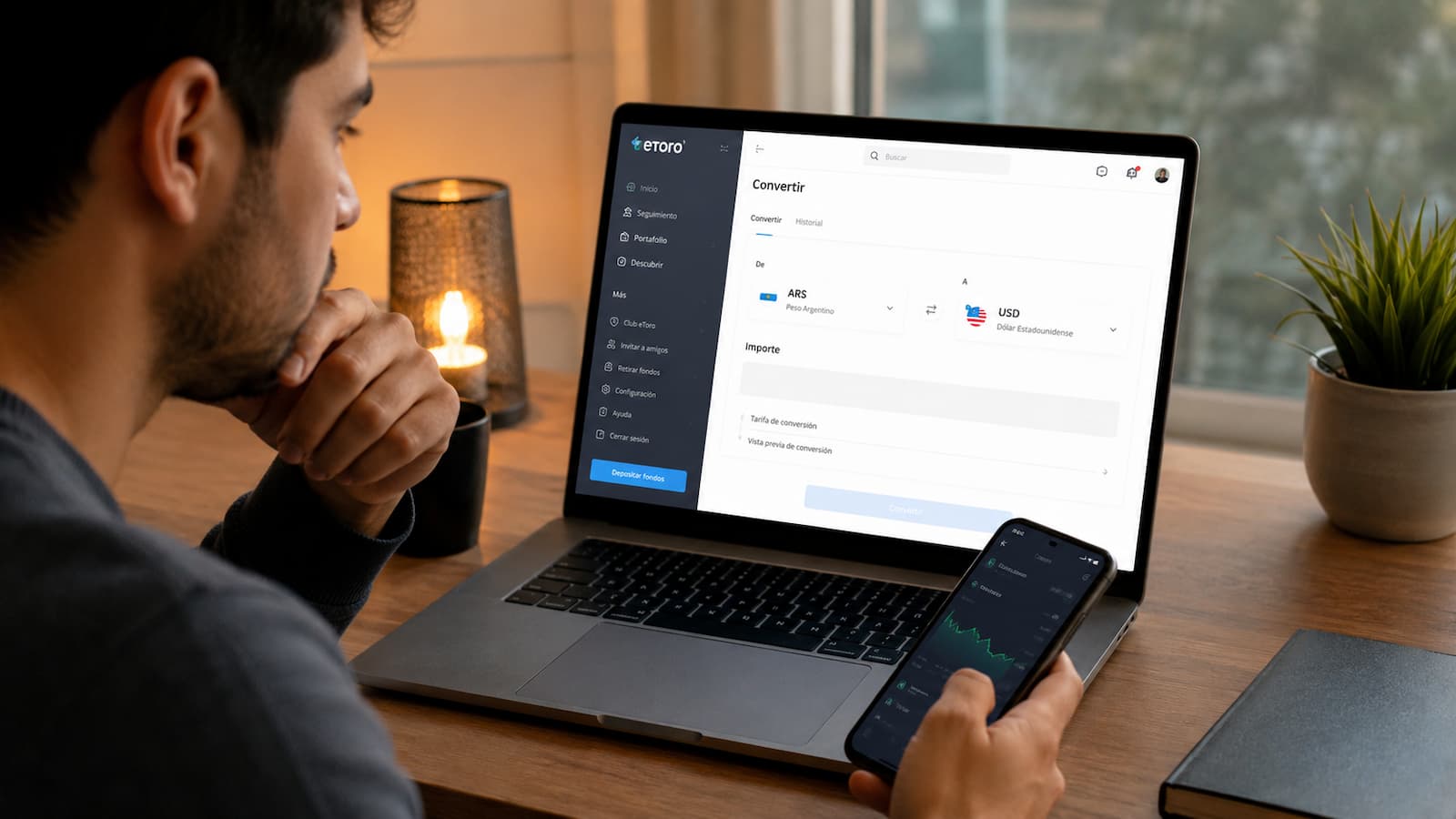 Usuario revisa el coste de convertir pesos a dólares en eToro